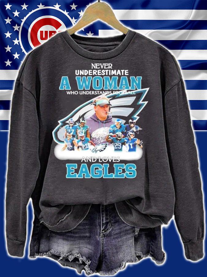 Never underestimate a woman who understands football and loves Eagles t-shirt sweatshirt